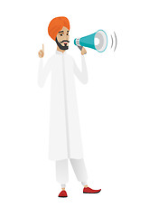 Image showing Hindu businessman talking into loudspeaker.
