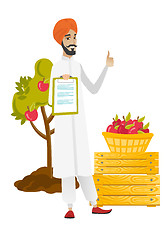 Image showing Farmer with clipboard giving thumb up.
