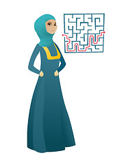 Image showing Business woman looking at labyrinth with solution