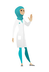 Image showing Muslim doctor showing stop hand gesture.