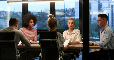 Image showing Multiethnic Business Team At A Meeting at modern office building