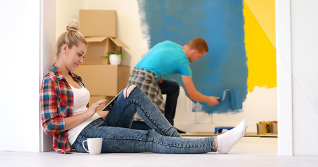 Image showing couple doing home renovations