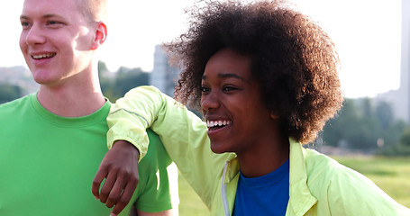 Image showing Portrait of multiethnic group of young people on the jogging