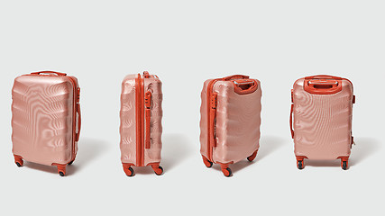 Image showing Collection of brown suitcases for travel on a gray background with with copy space. Creative layout.