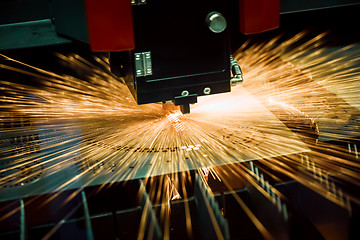 Image showing CNC Laser cutting of metal, modern industrial technology.