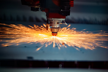 Image showing CNC Laser cutting of metal, modern industrial technology.