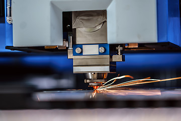 Image showing CNC Laser cutting of metal, modern industrial technology.