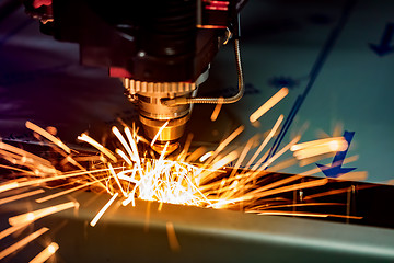 Image showing CNC Laser cutting of metal, modern industrial technology.