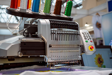 Image showing Automatic industrial sewing machine for stitch by digital patter