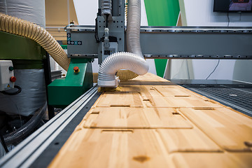 Image showing CNC woodworking wood processing machine, modern technology in th