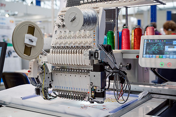 Image showing Automatic industrial sewing machine for stitch by digital patter