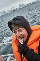 Image showing Glacier lagoon in Iceland, tasting ice pieces