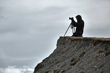 Image showing Photographer with tripod