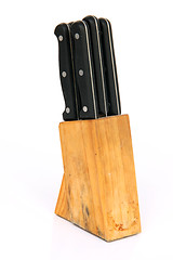 Image showing knifes in wooden base