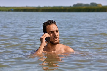 Image showing Smartphone at the beach