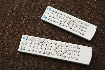 Image showing Remote controls for tv and dvd