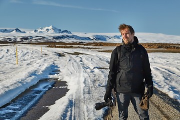 Image showing Landscape photographer in Iceland. The journey begins where the road ends