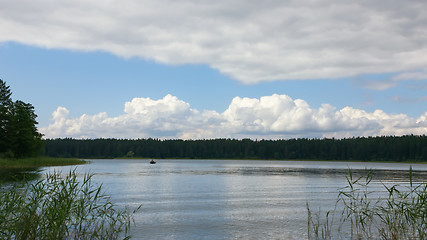 Image showing Summer Landscape With Cumulus Clouds Over The Forest Lake