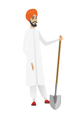 Image showing Young hindu farmer holding a shovel.