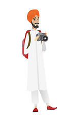 Image showing Hindu nature photographer with digital camera.