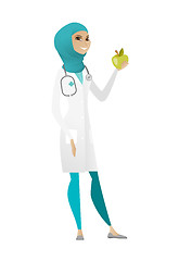 Image showing Nutritionist offering fresh red apple.