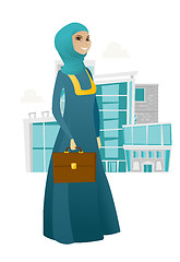 Image showing Muslim business woman holding briefcase.