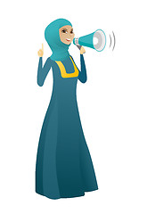 Image showing Muslim business woman talking into loudspeaker.