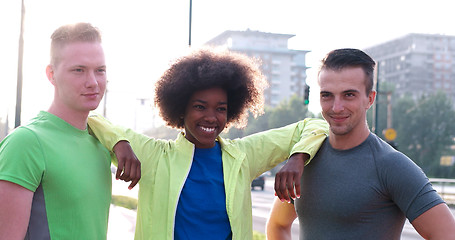 Image showing Portrait of multiethnic group of young people on the jogging