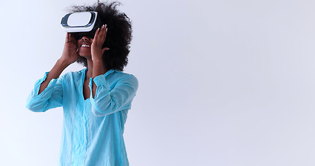 Image showing black girl using VR headset glasses of virtual reality