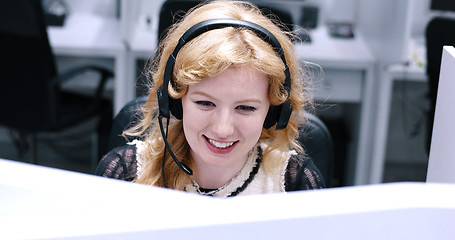 Image showing female call centre operator doing her job