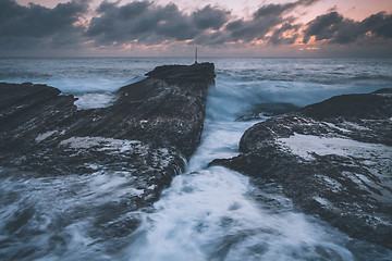 Image showing Dawn Skies, Moody Seas and Rocky Chasms Landscapes