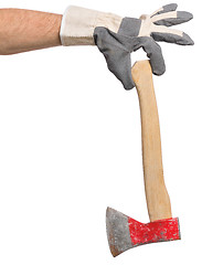 Image showing Worker hand with Ax