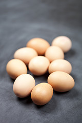 Image showing Farm organic chicken eggs on black background.