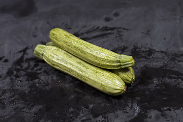 Image showing Fresh green wet zucchini.