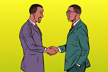 Image showing african businessmen men handshake