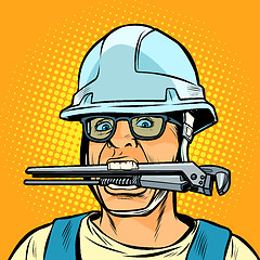 Image showing funny working professional plumber with a wrench