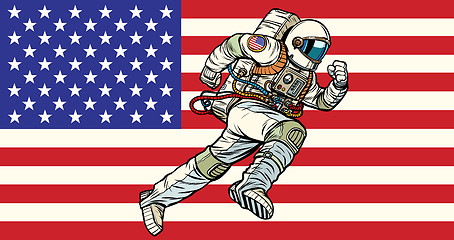 Image showing American astronaut patriot runs forward. USA flag