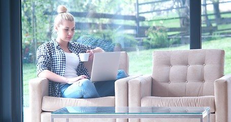 Image showing woman drinking coffee enjoying relaxing lifestyle