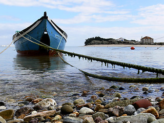 Image showing Small Boat in Coastal Scene.