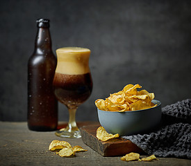 Image showing beer and snacks