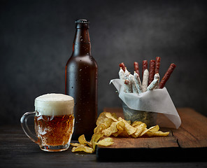 Image showing beer and snacks