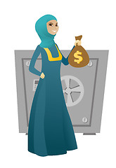 Image showing Muslim business woman holding a money bag.