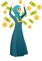 Image showing Happy busiess woman under money rain.