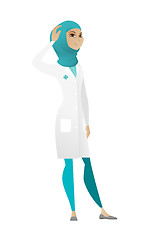 Image showing Young muslim doctor scratching her head.