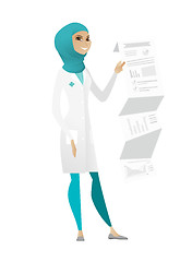 Image showing Doctor in medical gown giving presentation.