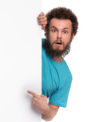 Image showing Crazy man with blank signboard