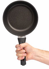 Image showing Hand with frying pan