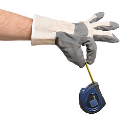 Image showing Worker hand with Tape-measure