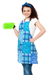 Image showing Young housewife on white