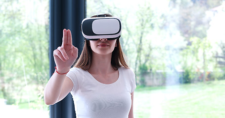 Image showing woman using VR-headset glasses of virtual reality